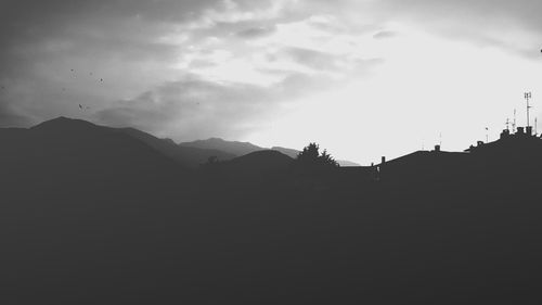 Silhouette of mountain against sky