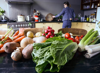 Fruits and vegetables on cutting board at home