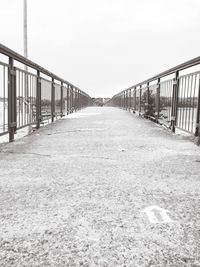 Empty road against clear sky