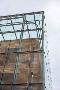 Low angle view of modern building against clear sky