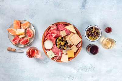Charcuterie and cheese board, overhead flat lay shot with copy space. italian antipasti