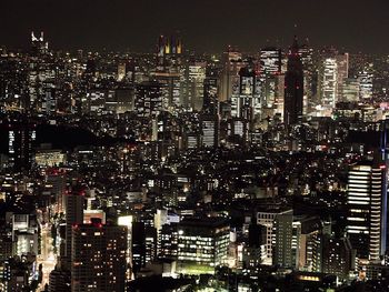 Illuminated cityscape at night