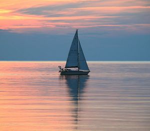 Scenic view of calm sea at sunset