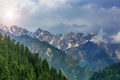 Scenic view of mountains against sky during winter