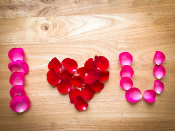 Directly above shot of heart shaped flowers on table