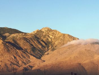 Scenic view of mountains against clear sky