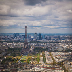 Cityscape against cloudy sky