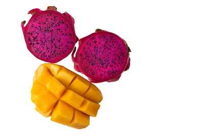 Close-up of fruits against white background