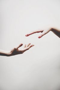 Cropped image of woman holding hands