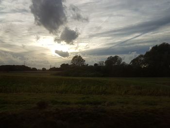 Scenic view of field against sky