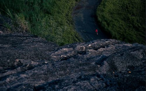 People standing on rock formation