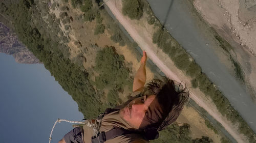 High angle view of woman standing in water