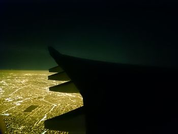 Low angle view of airplane against sky