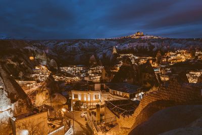 High angle view of illuminated buildings in city