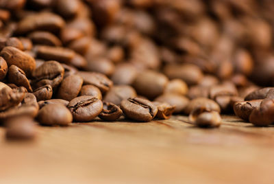 Close-up of coffee beans on table