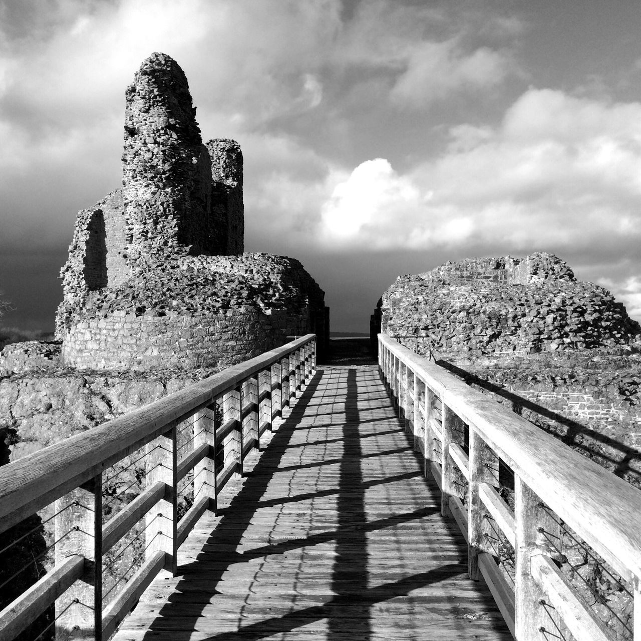 architecture, sky, built structure, cloud - sky, the way forward, railing, cloudy, building exterior, cloud, water, day, steps, sea, leading, outdoors, nature, no people, tranquility, diminishing perspective, tree