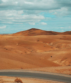 Scenic view of desert against sky