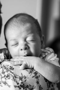 Close-up portrait of cute baby at home