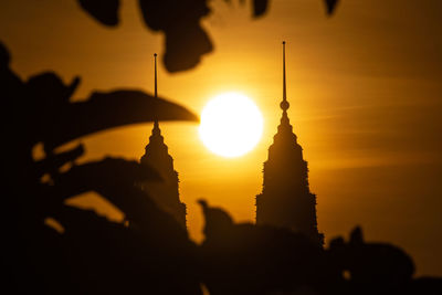 Silhouette of building during sunset