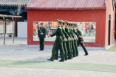 Group of people in front of building