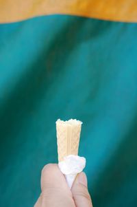 Midsection of person holding ice cream