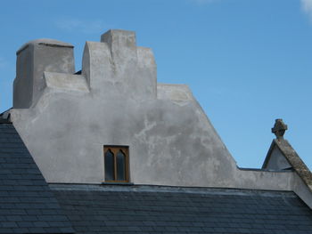 Low angle view of built structure against clear sky