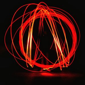 Light trails over black background