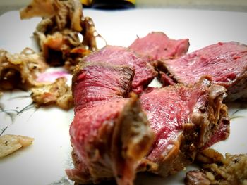 Close-up of meat on barbecue grill