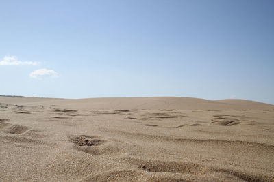 Scenic view of desert against sky