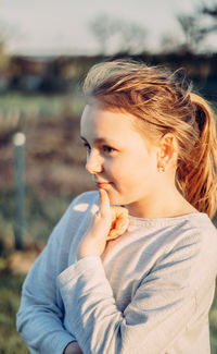 Portrait of girl looking away