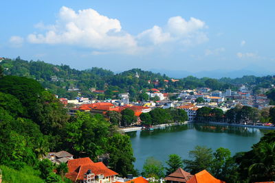 High angle view of townscape against cloudy sky