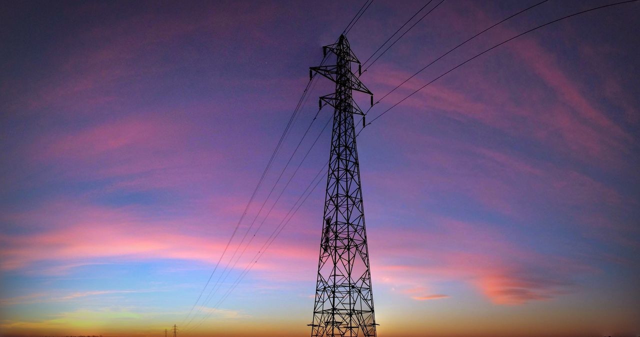 electricity pylon, power line, low angle view, power supply, sunset, electricity, connection, silhouette, fuel and power generation, sky, technology, cable, orange color, cloud - sky, dusk, electricity tower, cloud, power cable, outdoors, no people