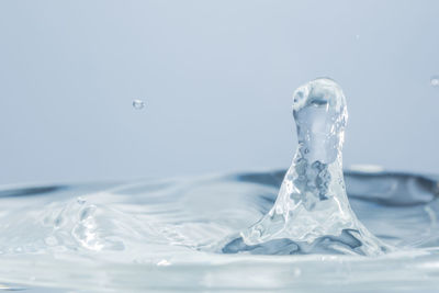 Close-up of rippled water against white background