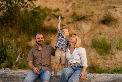 Family at the summer vacation. father and mother bonding toddler son