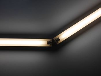 Low angle view of illuminated wall
