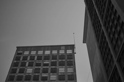 Low angle view of buildings against clear sky