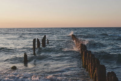 Scenic view of sea against sky during sunset