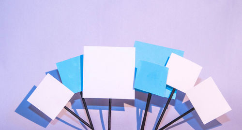 Close-up of objects on table against white background