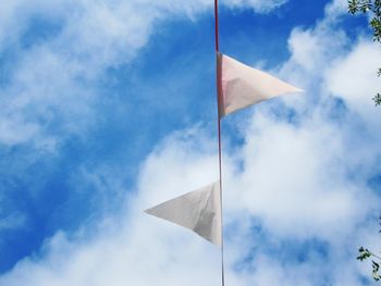 Low angle view of flag against sky