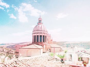 View of cathedral and buildings against sky