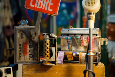 Close-up of information sign on table