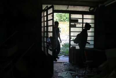 People in corridor of building