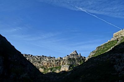 Low angle view of fort against blue sky