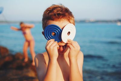 Playful boy on beach