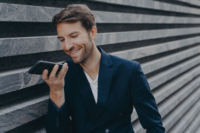 Young man using mobile phone