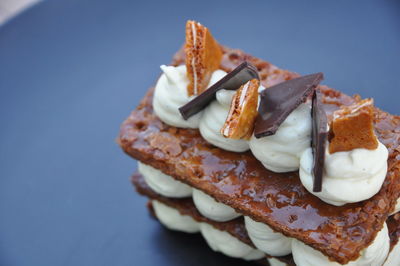 Close-up of cake against white background