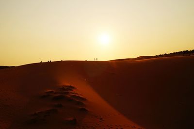 Scenic view of landscape at sunset