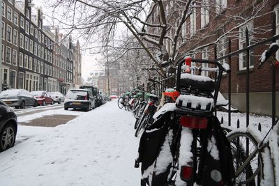 Cars on snow in city