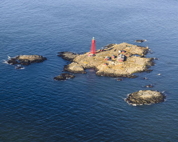 Aerial view of island with lighthouse