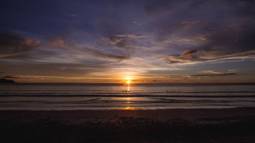 Scenic view of sea against sky during sunset